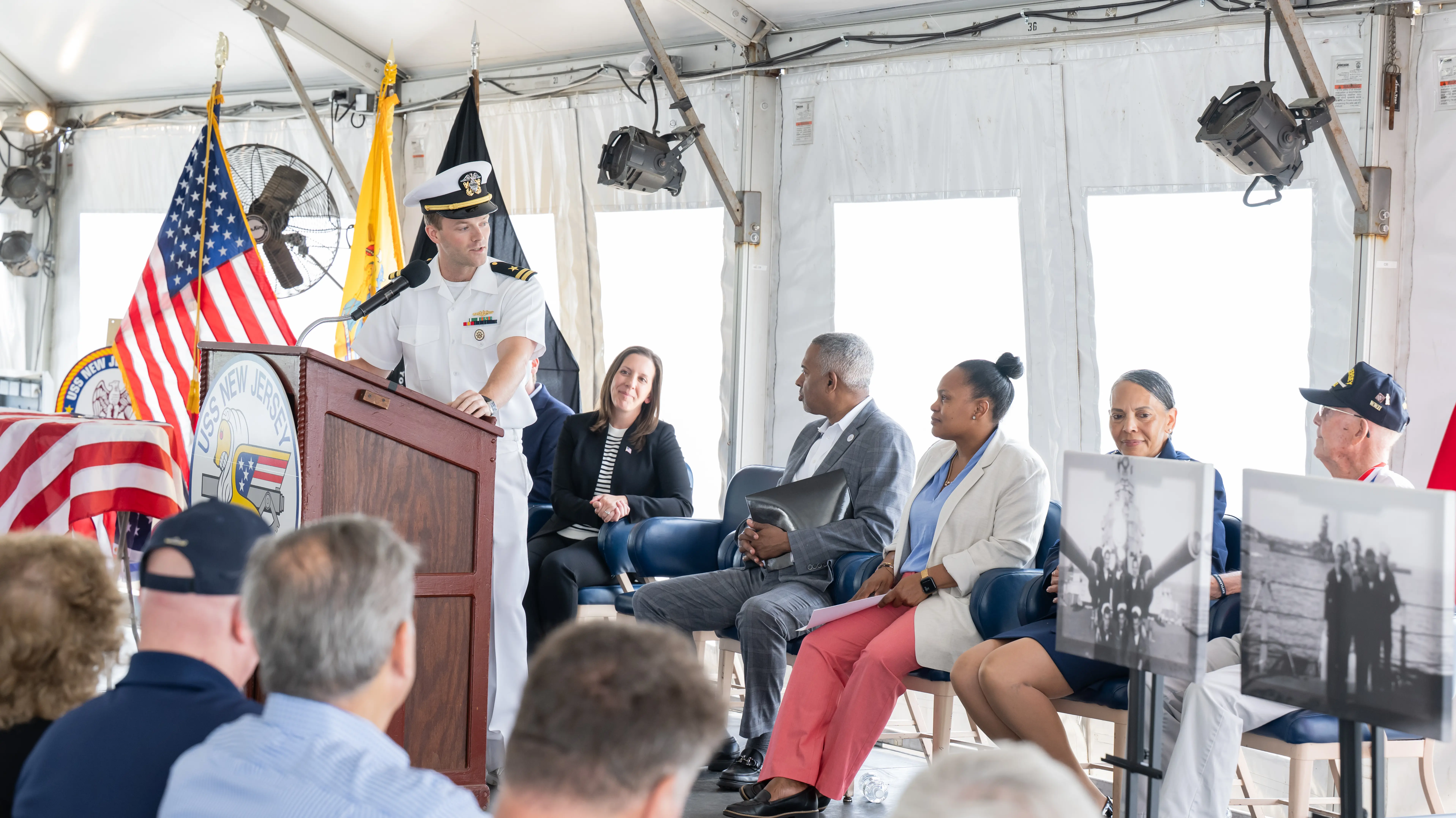 Paul Robbins with attendees during the June 15 ceremony aboard Battleship New Jersey.